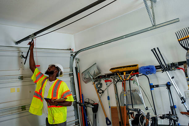 Professional Garage Door Panel Replacement technician working in Mayfield Heights, OH
